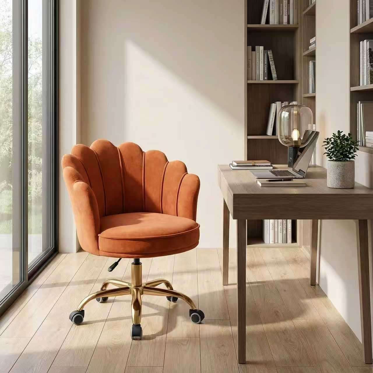 Orange velvet shell office chair with gold base, height adjustable and swivel wheels