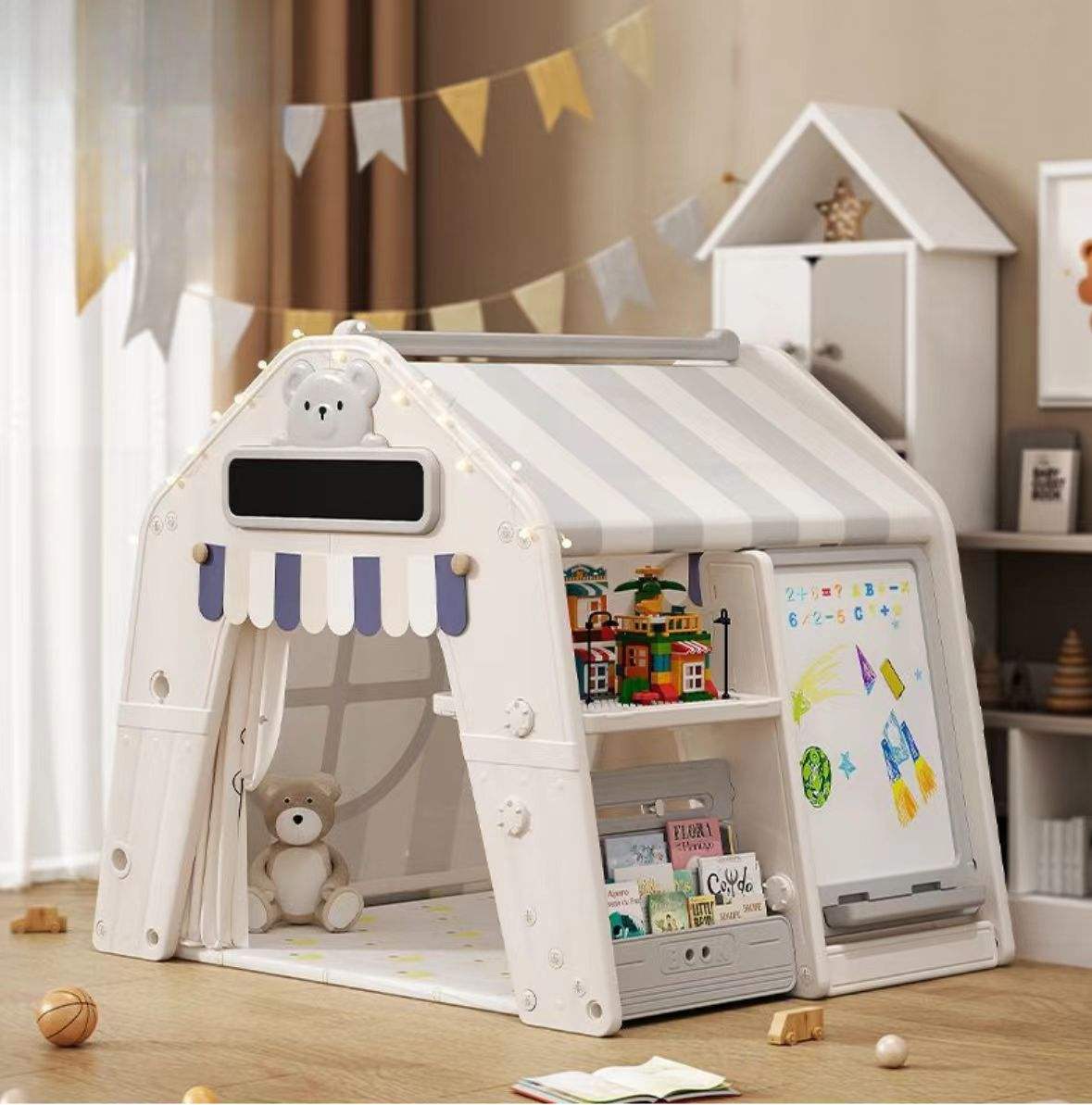 Grijze kunststof speelhuis tent voor binnen en buiten met stoffen dak, geschikt voor peuters en kleuters, inclusief werkblad en tekenbord.